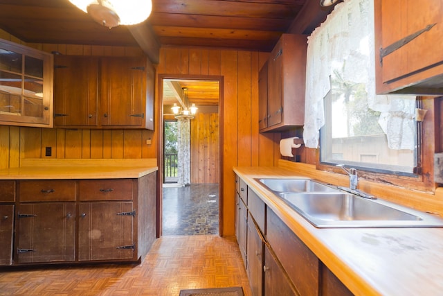 16-1331 Opeapea Rd, Mountain View, HI 96760 - kitchen with wood ceiling, light countertops, wooden walls, and a chandelier