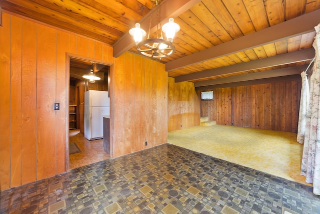 16-1331 Opeapea Rd, Mountain View, HI 96760 - unfurnished room with wooden walls, tile patterned floors, a wooden ceiling with exposed beams, and a chandelier