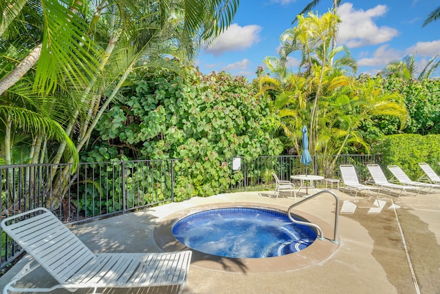 525 Aleka Lp Unit F15, Kapaa, HI 96746 - view of swimming pool with a hot tub and a patio area