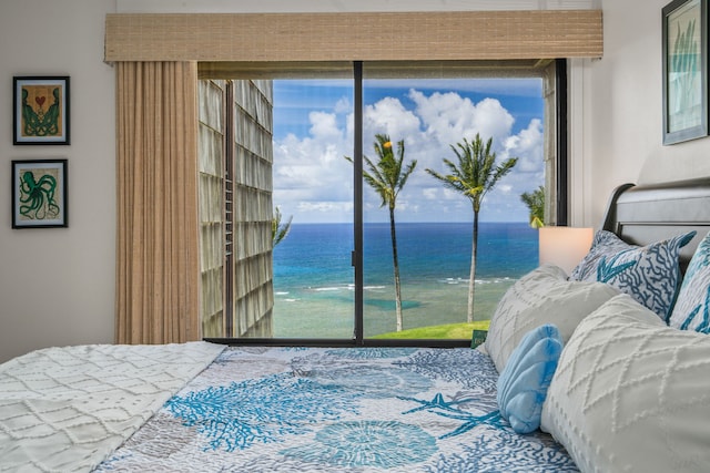 3700 Kamehameha Rd Unit H5, Princeville, HI 96722 - bedroom featuring access to exterior, a water view, and multiple windows