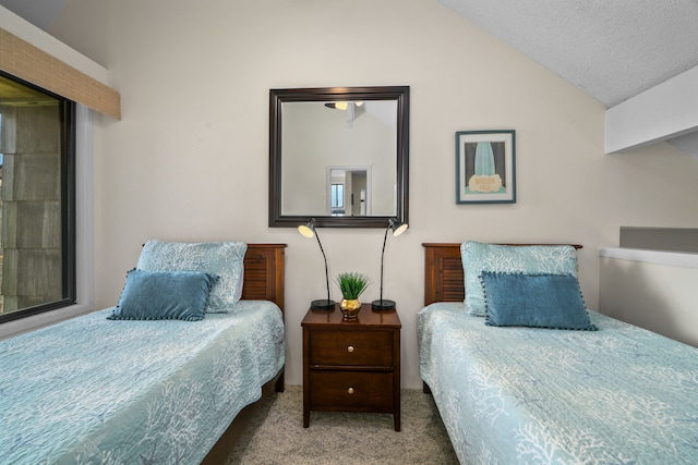 3700 Kamehameha Rd Unit H5, Princeville, HI 96722 - bedroom with lofted ceiling and carpet floors