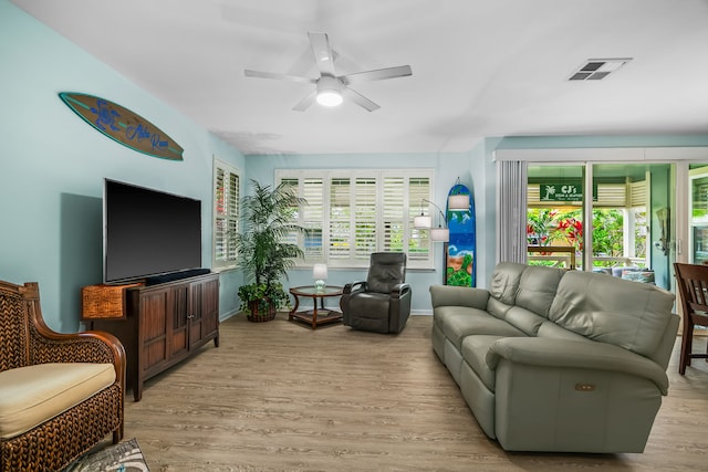 4919 Pepelani Lp Unit 2A, Princeville, HI 96722 - living room featuring ceiling fan and light wood finished floors