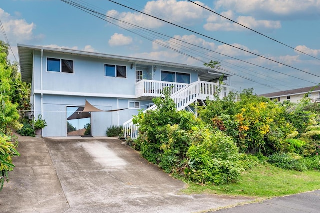 76-6132 Plumeria Rd, Kailua-Kona, HI 96740 - view of front of home featuring concrete driveway and stairs