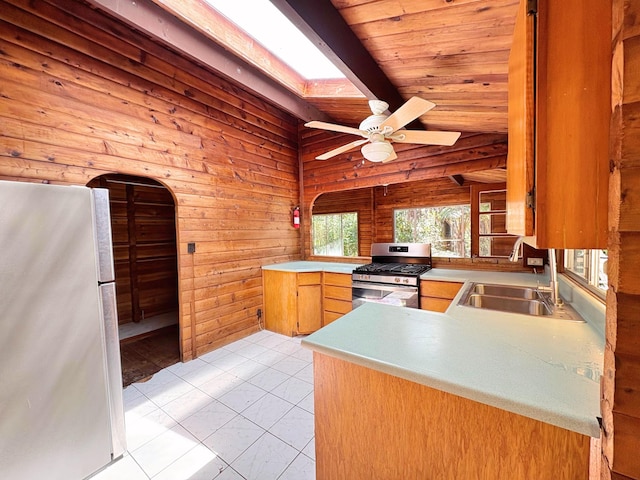 11-3927 8th St, Volcano, HI 96785 - kitchen with appliances with stainless steel finishes, a ceiling fan, wood walls, wood ceiling, and light countertops