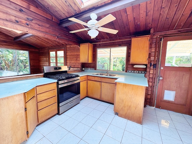 11-3927 8th St, Volcano, HI 96785 - kitchen featuring stainless steel gas range oven, wood ceiling, light countertops, a peninsula, and wood walls