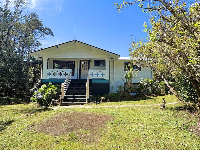 11-3927 8th St, Volcano, HI 96785 - single story home featuring covered porch, a front lawn, and stairs