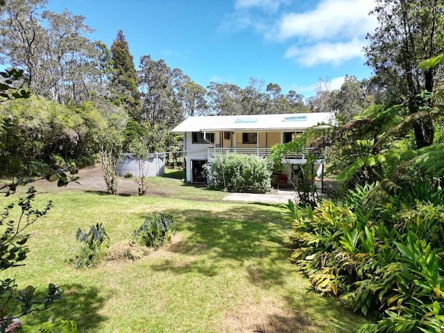 11-3927 8th St, Volcano, HI 96785 - view of grassy yard featuring stairway and a porch