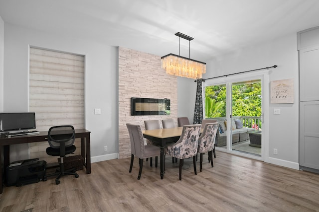 5970-A Heamoi Pl, Kapaa, HI 96746 - dining room featuring a chandelier, wood finished floors, and a desk