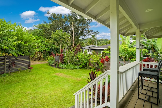 5970-A Heamoi Pl, Kapaa, HI 96746 - view of green lawn with covered porch and view of scattered trees
