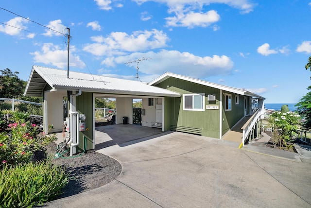 88-1557 Umi Ave, Captain Cook, HI 96704 - view of front of property with concrete driveway and a carport