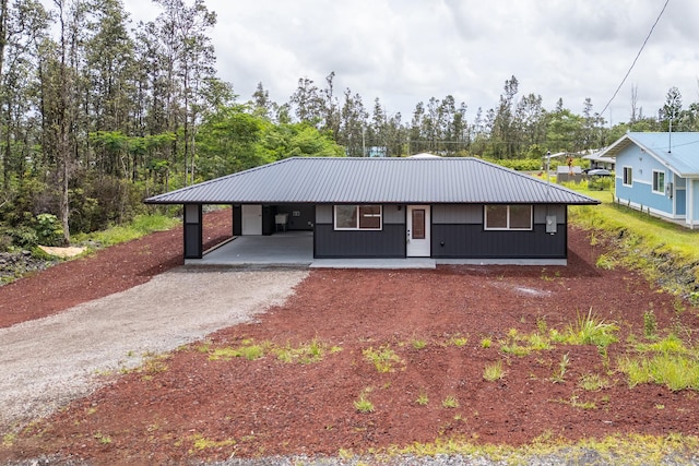 16-2069 Azure Dr, Pahoa, HI 96778 - ranch-style house with a metal roof, an attached carport, and driveway