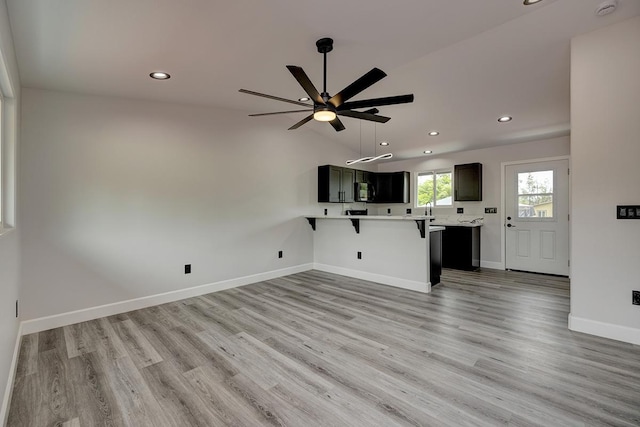 16-2069 Azure Dr, Pahoa, HI 96778 - unfurnished living room featuring recessed lighting, a ceiling fan, light wood-style flooring, and vaulted ceiling