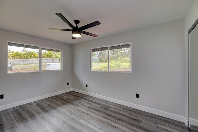 16-2069 Azure Dr, Pahoa, HI 96778 - unfurnished room with wood finished floors and ceiling fan