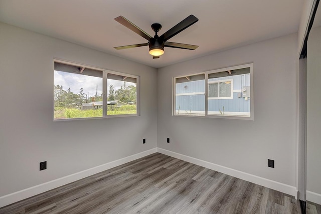 16-2069 Azure Dr, Pahoa, HI 96778 - unfurnished room featuring wood finished floors and ceiling fan