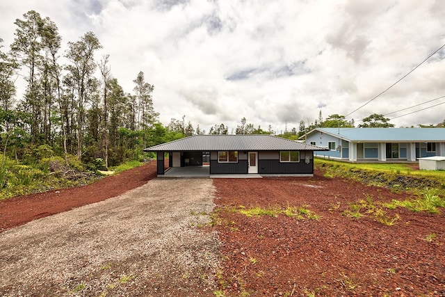 16-2069 Azure Dr, Pahoa, HI 96778 - single story home featuring driveway, a metal roof, and a carport