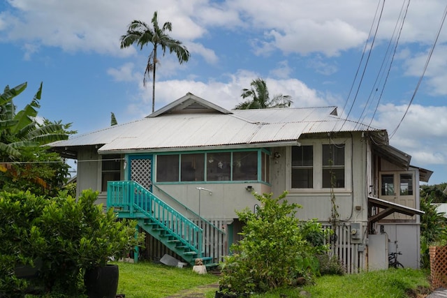 398 Ohai St, Hilo, HI 96720 - back of house with stairway and a metal roof