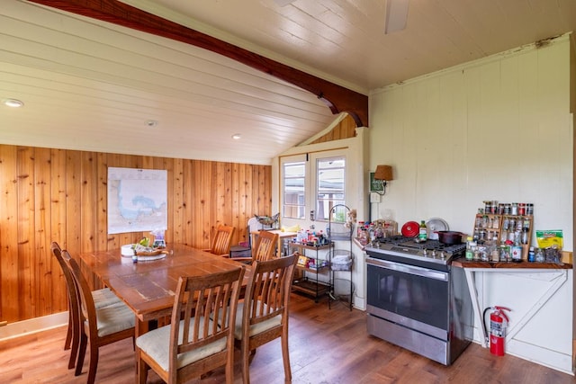 398 Ohai St, Hilo, HI 96720 - dining area featuring wooden ceiling, wood finished floors, wooden walls, and ceiling fan