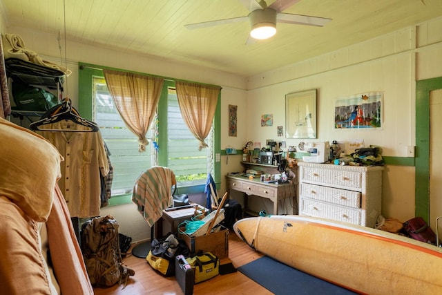 398 Ohai St, Hilo, HI 96720 - bedroom with wood finished floors and ceiling fan