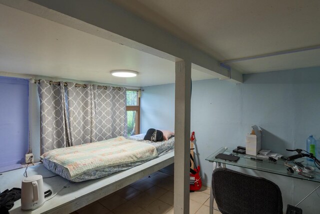 398 Ohai St, Hilo, HI 96720 - bedroom with light tile patterned floors