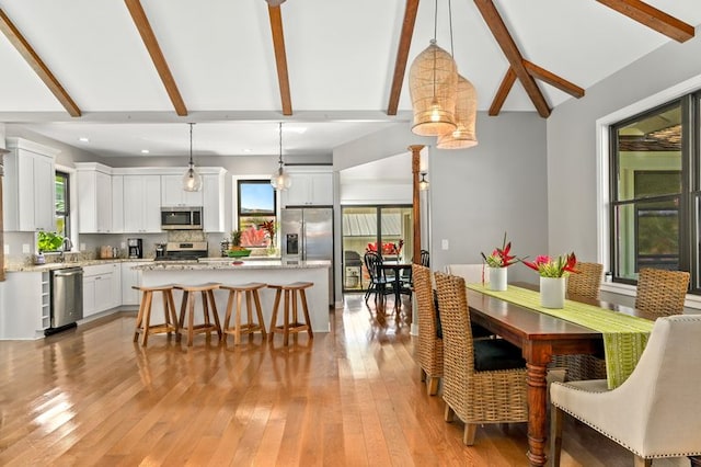 5414 Nakoa St, Koloa, HI 96756 - dining area featuring light wood-style flooring and recessed lighting