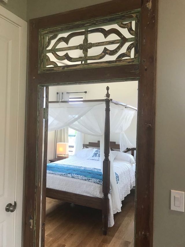 5414 Nakoa St, Koloa, HI 96756 - bedroom featuring wood finished floors