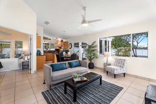 75-217 Nani Kailua Dr Unit 157, Kailua-Kona, HI 96740 - living area with light tile patterned floors, lofted ceiling, and a ceiling fan