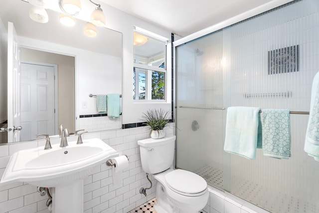 75-217 Nani Kailua Dr Unit 157, Kailua-Kona, HI 96740 - bathroom with a stall shower and tile walls