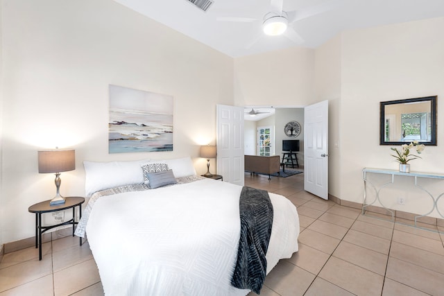 75-217 Nani Kailua Dr Unit 157, Kailua-Kona, HI 96740 - bedroom with light tile patterned floors, a towering ceiling, and ceiling fan