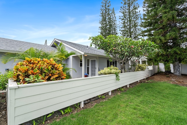75-217 Nani Kailua Dr Unit 157, Kailua-Kona, HI 96740 - view of side of property featuring a lawn