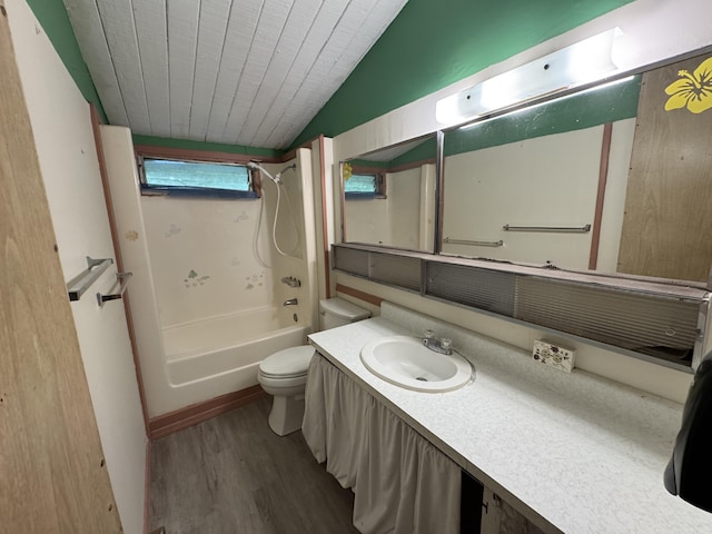 18-7855 Kulani Rd, Mountain View, HI 96771 - bathroom with wood finished floors, tub / shower combination, vanity, and vaulted ceiling