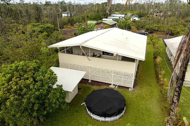16-1885 Uilani Dr, Pahoa, HI 96778 - aerial view of property and surrounding area featuring a forest