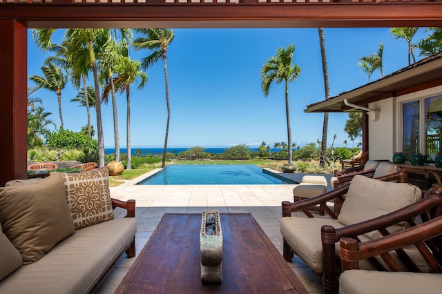 72-106 Hainoa Pl Unit 4, Kailua-Kona, HI 96740 - swimming pool with a patio, a water view, and outdoor lounge area
