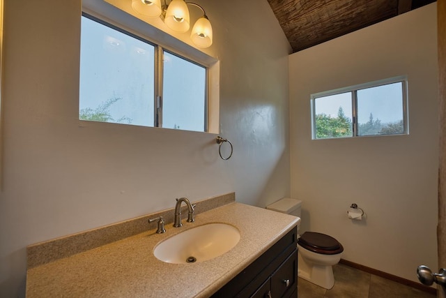 45-3463 Kahana Dr, Honokaa, HI 96727 - bathroom with vanity, vaulted ceiling, and tile patterned floors