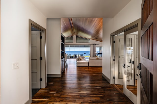 59-217 Lele Naia Dr, Kamuela, HI 96743 - hallway featuring dark wood-type flooring and vaulted ceiling