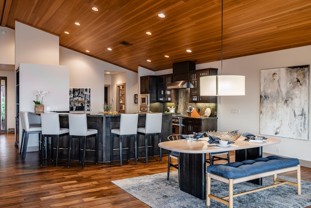 59-217 Lele Naia Dr, Kamuela, HI 96743 - dining space with wooden ceiling, dark wood-type flooring, lofted ceiling, and recessed lighting