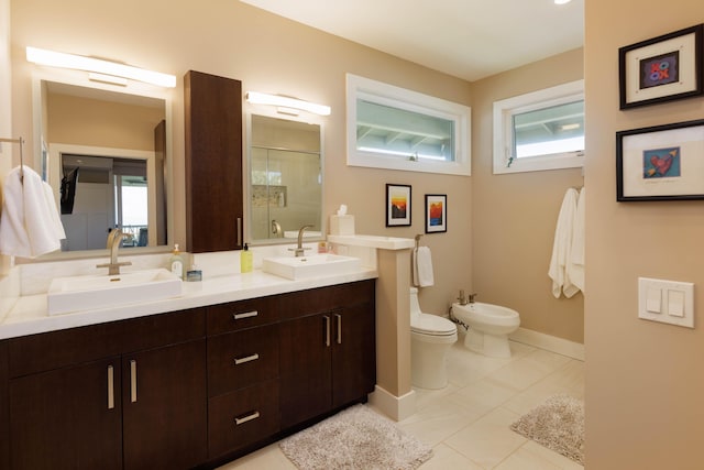 68-3609 Eleele St, Waikoloa, HI 96738 - bathroom with a bidet, a stall shower, double vanity, and tile patterned floors