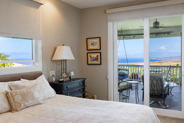 68-3609 Eleele St, Waikoloa, HI 96738 - carpeted bedroom with access to outside and a water view