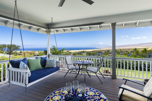 68-3609 Eleele St, Waikoloa, HI 96738 - deck with ceiling fan, outdoor dining area, and an outdoor living space