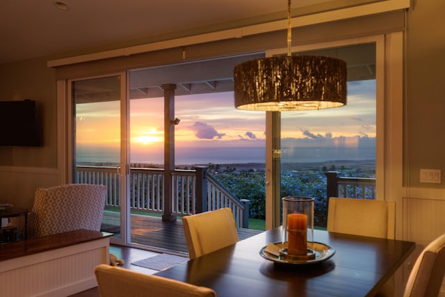 68-3609 Eleele St, Waikoloa, HI 96738 - dining space featuring a wainscoted wall and plenty of natural light