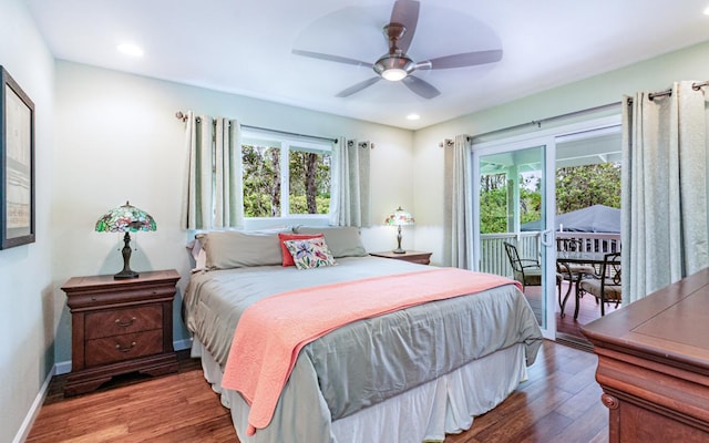 11-3082 Pa Alii St, Volcano, HI 96785 - bedroom with multiple windows, wood finished floors, access to exterior, and recessed lighting