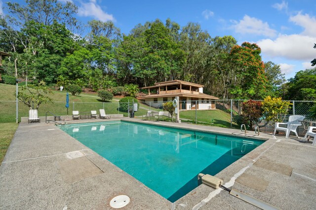 4701 Kawaihau Rd Unit B201, Kapaa, HI 96746 - view of swimming pool featuring a patio area and view of scattered trees