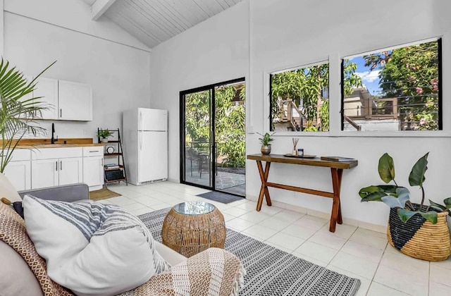 73-4338 Napoo Pl, Kailua-Kona, HI 96740 - living area with high vaulted ceiling, light tile patterned floors, and a wooden ceiling with exposed beams