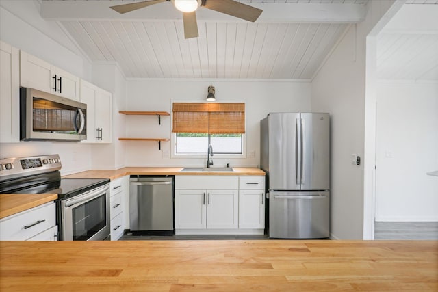 73-4338 Napoo Pl, Kailua-Kona, HI 96740 - kitchen with stainless steel appliances, wooden counters, white cabinetry, open shelves, and a ceiling fan