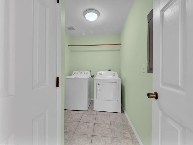 15-947 Paradise Ala Kai Dr, Keaau, HI 96749 - laundry room featuring separate washer and dryer and light tile patterned floors