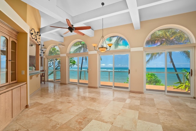 4491 Kikiaola Pl, Kekaha, HI 96752 - unfurnished sunroom featuring beam ceiling, a water view, coffered ceiling, and a chandelier