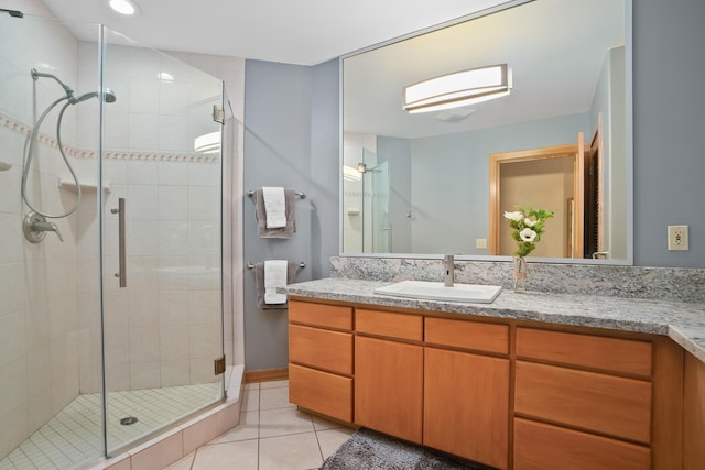 4491 Kikiaola Pl, Kekaha, HI 96752 - bathroom featuring vanity, a shower stall, and tile patterned flooring