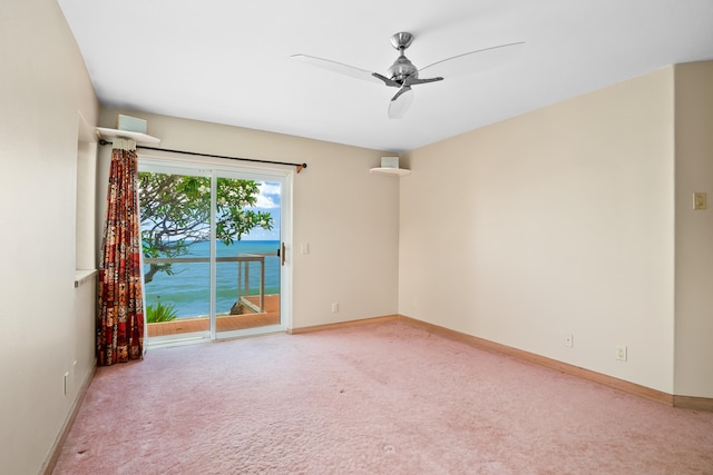 4491 Kikiaola Pl, Kekaha, HI 96752 - unfurnished room with light colored carpet and ceiling fan