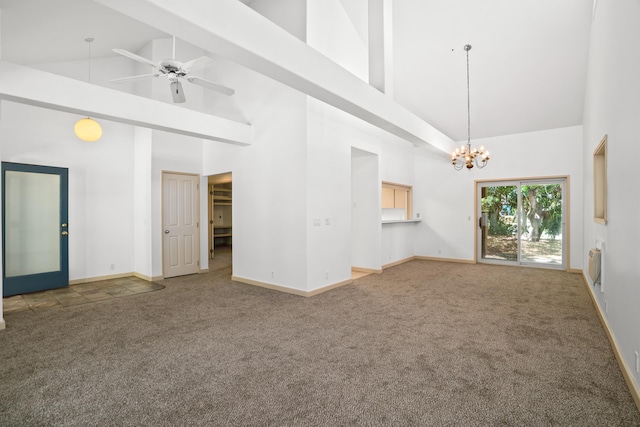 4491 Kikiaola Pl, Kekaha, HI 96752 - unfurnished room with high vaulted ceiling, carpet floors, a chandelier, and a ceiling fan