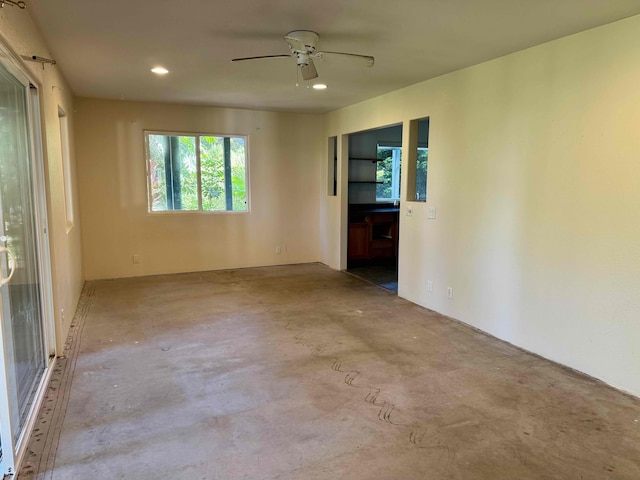 78-6694 Mamalahoa Hwy, Holualoa, HI 96740 - unfurnished room featuring concrete floors, a ceiling fan, and recessed lighting