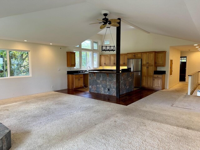 78-6694 Mamalahoa Hwy, Holualoa, HI 96740 - kitchen featuring stainless steel fridge, dark colored carpet, a ceiling fan, dark countertops, and open floor plan
